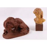 A glazed pottery figure, after the Barre Bronze, a lion with serpent, together with a wax head and