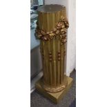 A 20th Century giltwood neo-classical column, surrounded by garland of flower heads, 119cm high.