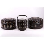 Three Korean wedding baskets in black lacquer / paper mache, inlaid with mother of pearl. (3).