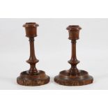 A pair of Boer War Trench Art candlesticks, inscribed on the border and dated 1900, having