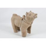 An antique Chinese terracotta model of a dog, 2000 B.C., 24cm high.