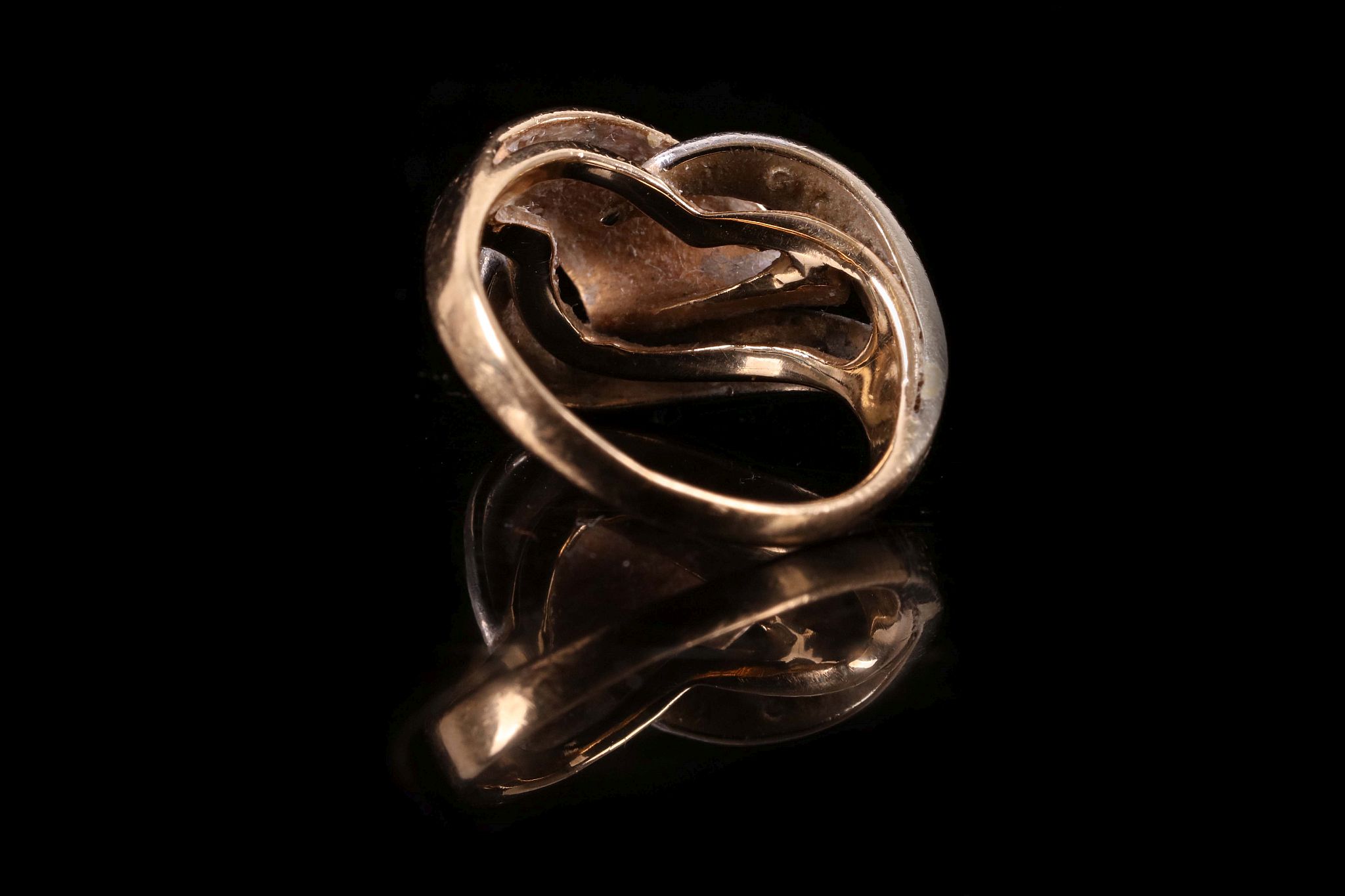 A 14ct yellow gold and diamond set entwined loop ring. - Image 2 of 2