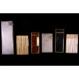 A collection of 6 lighters, including Dunhill, Cartier & Dupont examples.