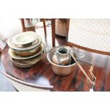 A collection of Middle Eastern copper ware to include, kitchen pans, trays, kettles, ladles etc.