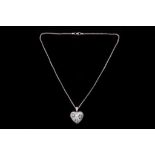 An 18ct white gold heart pendant, pavè set with emeralds and diamonds and suspended from an 18ct