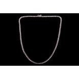 An 18ct white gold and diamond set necklace.