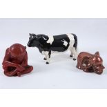 A Beswick pottery model of a country cow, titled to the base 'Coddington Hilt Bar', a Danish model