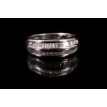 A c.1990's 14k white gold and diamond set double row half eternity ring. Size: K.