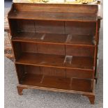 An Edwardian mahogany open waterfall bookcase of small size, 72cm wide.