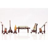 A SET OF SIX CHINESE CARVED HARDSTONE MUSICAL INSTRUMENTS. 20th Century. Carved from a range of