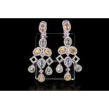 A pair of gem-set earrings Of chandelier design, each set throughout with multi-coloured sapphires