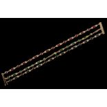 A triple-strand emerald, sapphire, ruby and diamond-set bracelet Each articulated row set with