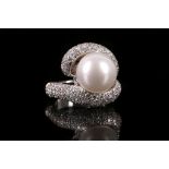 A cultured pearl and diamond dress ring The 12.3mm cultured pearl, to crossover lines pave-set