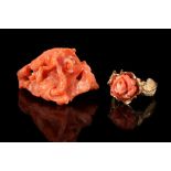 A carved coral ring and A 19th century carved coral pendant 1st: The coral, corallium rubrum, carved
