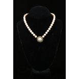 A cultured pearl necklace with mabè pearl clasp The single-strand of 8.7-9.1mm cultured pearls, to a