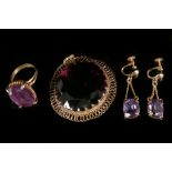 Suite of synthetic purple stone jewellery Comprising a pendant, a ring and a pair of pendent