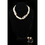 A cultured pearl necklace and a pair of hoop earrings. 1st: The four-strands of freshwater pearls,