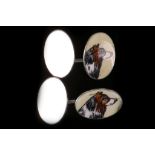 A pair of cufflinks Of oval form, decorated with a border collie in profile.