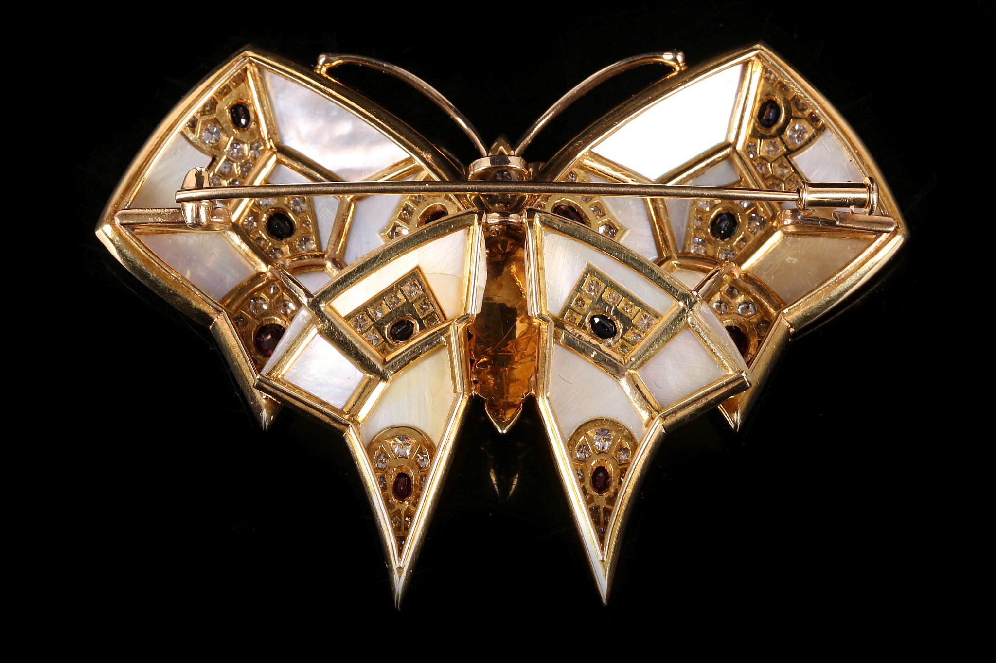 A mother-of-pearl, sapphire, ruby and diamond butterfly brooch The mother-of-pearl wings accented by - Image 2 of 2