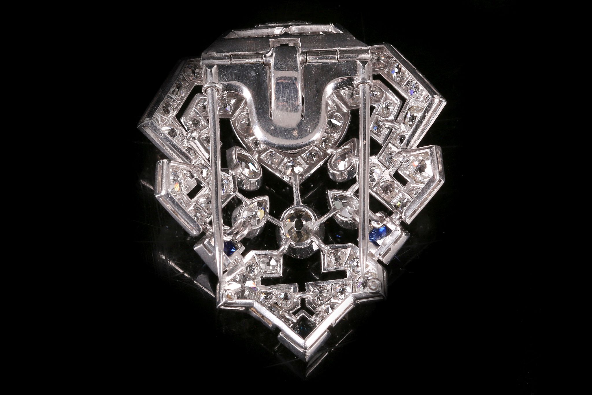 An Art Deco sapphire and diamond clip brooch, circa 1925 Of geometric form, set throughout with - Image 2 of 2