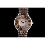 LADIES CARTIER 21 WRISTWATCH. A ladies two-tone stainless steel and gold plated 'Cartier 21'