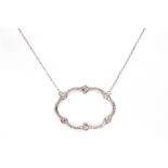 A diamond pendant necklace The openwork oval pendant set with brilliant and rose-cut diamonds,