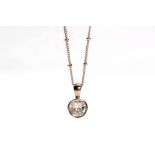 A diamond single-stone pendant necklace The collet-set old brilliant-cut diamond, suspended from a