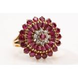 A garnet and moissanite cluster ring Set with baguette and circular-cut garnets centrally set with a