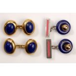 Two pairs of lapis lazuli cufflinks 1st: Double-sided: Each oval cabochon lapis lazuli within a