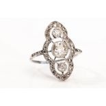 A diamond dress plaque ring Set with three millegrain collet-set old brilliant-cut diamonds, to an