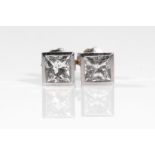 A pair of diamond earstuds Each princess-cut diamond in a collet-setting, diamonds approx. 1.20cts