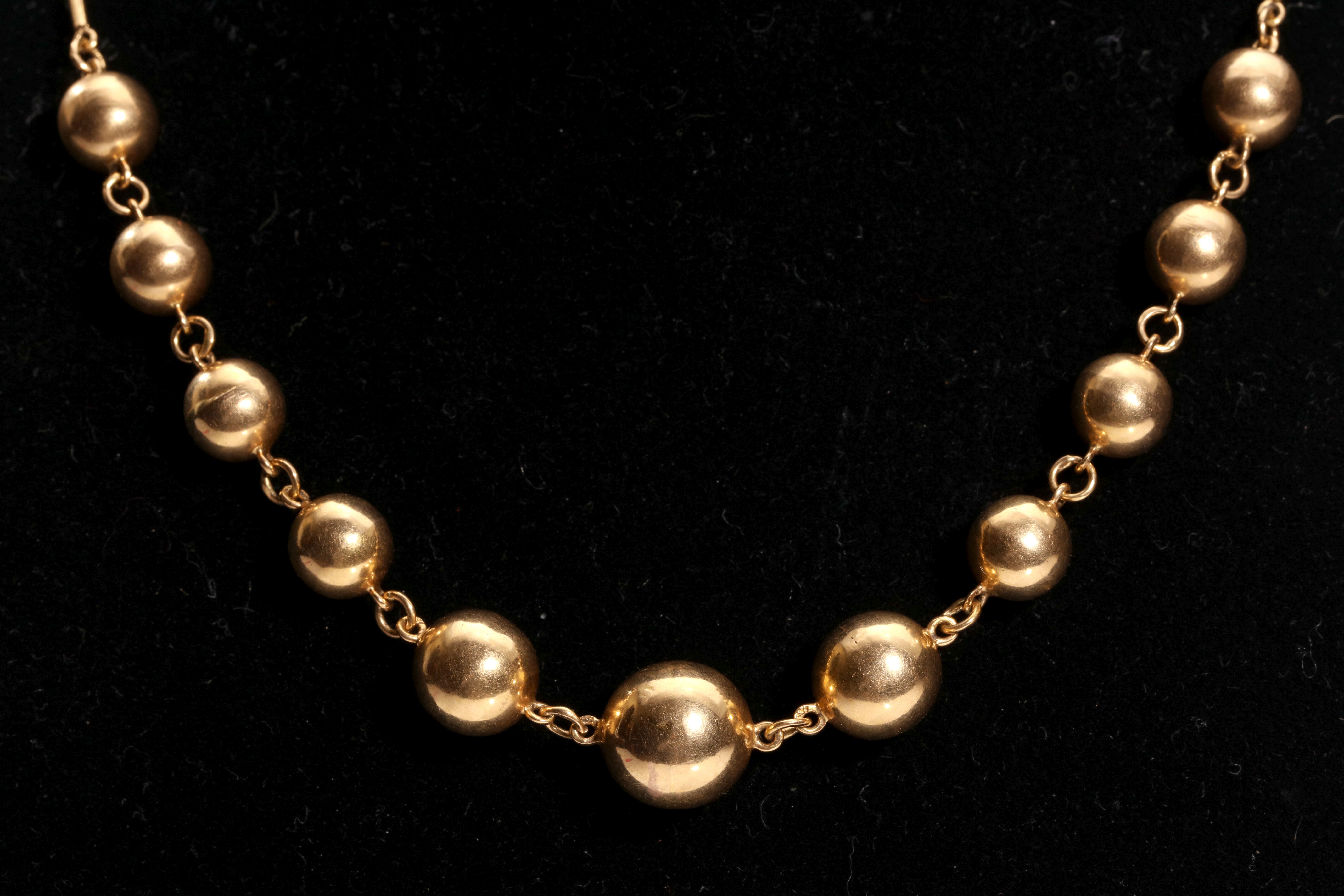 A ball necklace The baton-link necklace, set to the front with graduated polished ball accents, - Image 3 of 4