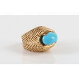 A turquoise dress ring, circa 1965 Of bombè form, with ropetwist detail throughout, featuring an