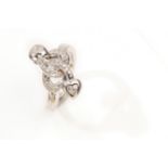 A diamond dress ring Featuring an entwined brilliant-cut diamond heart motif, ring size K