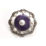 A pearl, enamel and diamond brooch, circa 1905 The purple guilloché enamel disc set with a 5.5mm