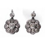 A pair of late 19th century diamond cluster earrings Each designed as a cluster of collet-set