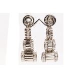 A pair of diamond earrings Of fluted tiered design, set throughout with old brilliant and