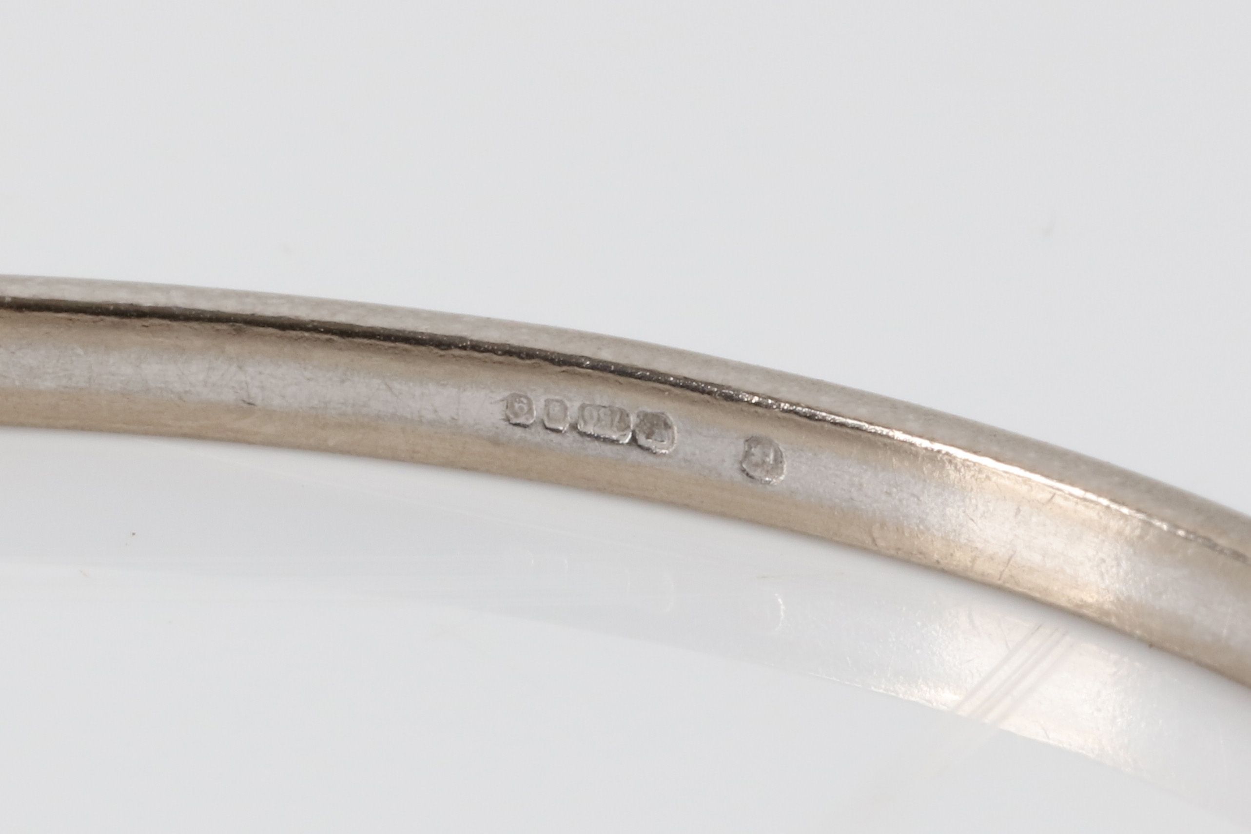 A white gold and diamond bangle, by Theo Fennell The thin brushed 18 carat white gold bangle set - Image 2 of 2