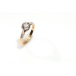 A diamond single-stone ring The cushion-shaped diamond, in an eight-claw setting, diamond approx.