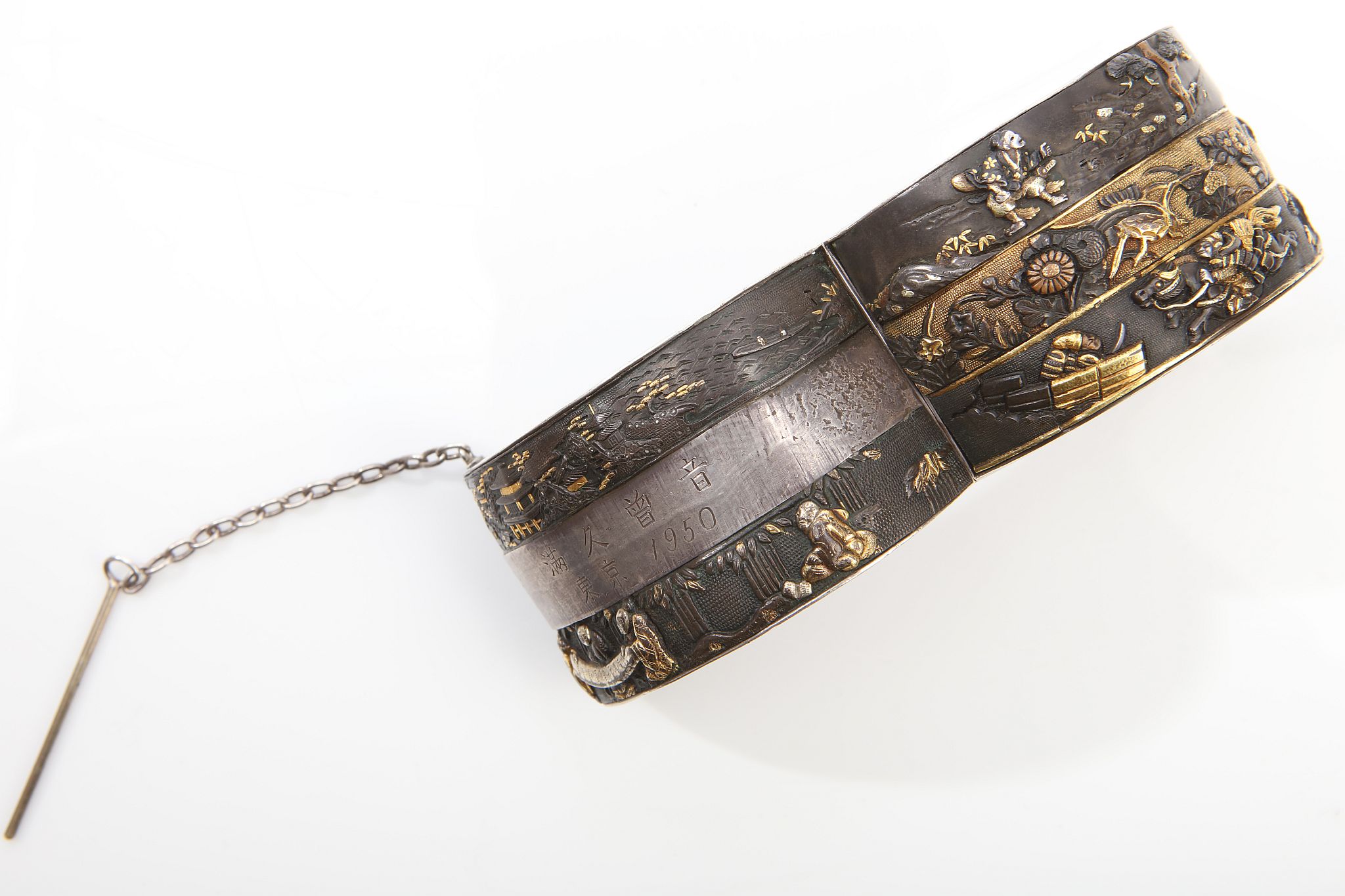 A Shakudo-style bangle The wide bandle decorated with Japanese style motifs, inner diameter 6.1cm - Image 2 of 2