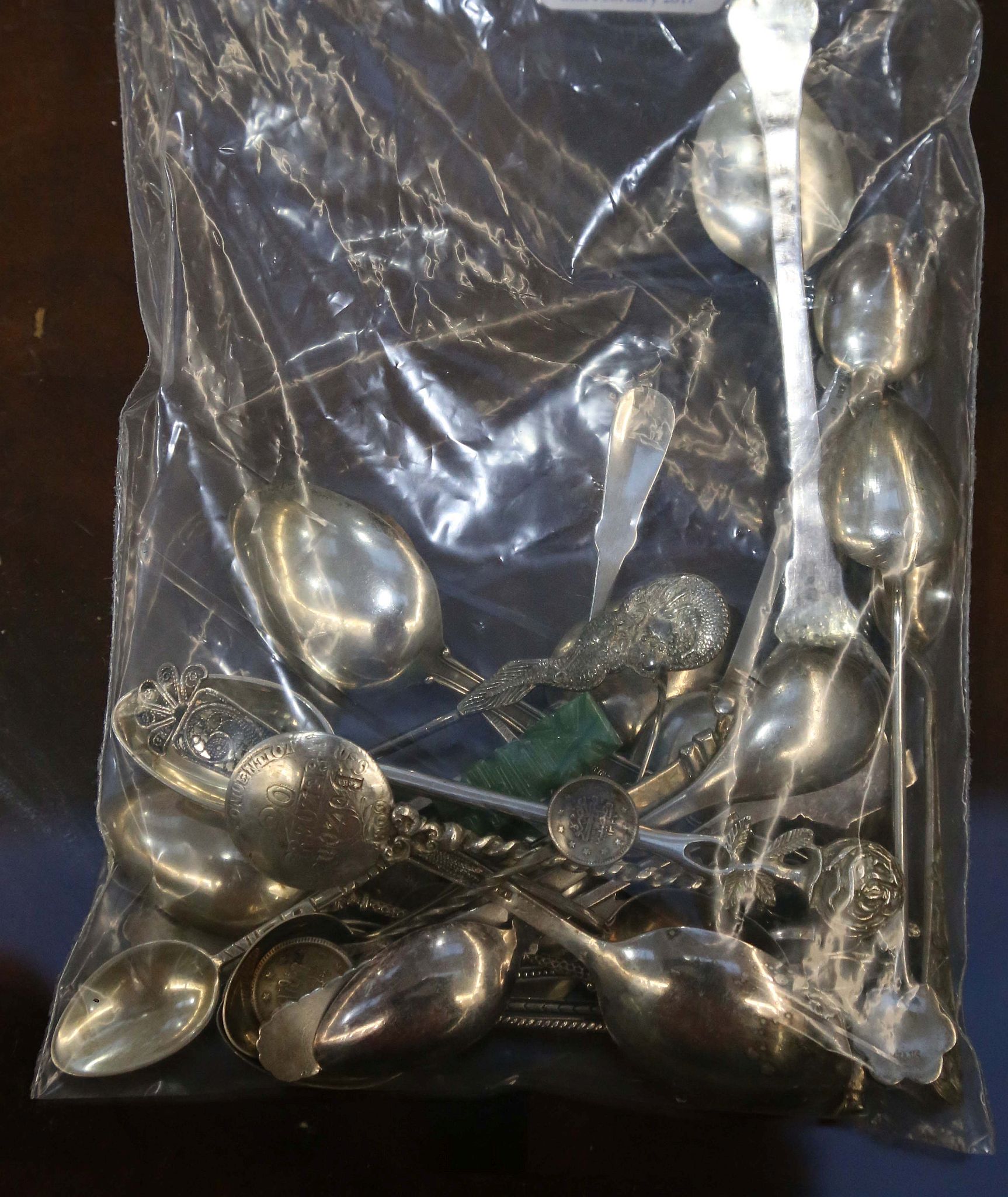 A mixed group of 800, 835 marked Continental silver souvenir spoons and other flatware. Including