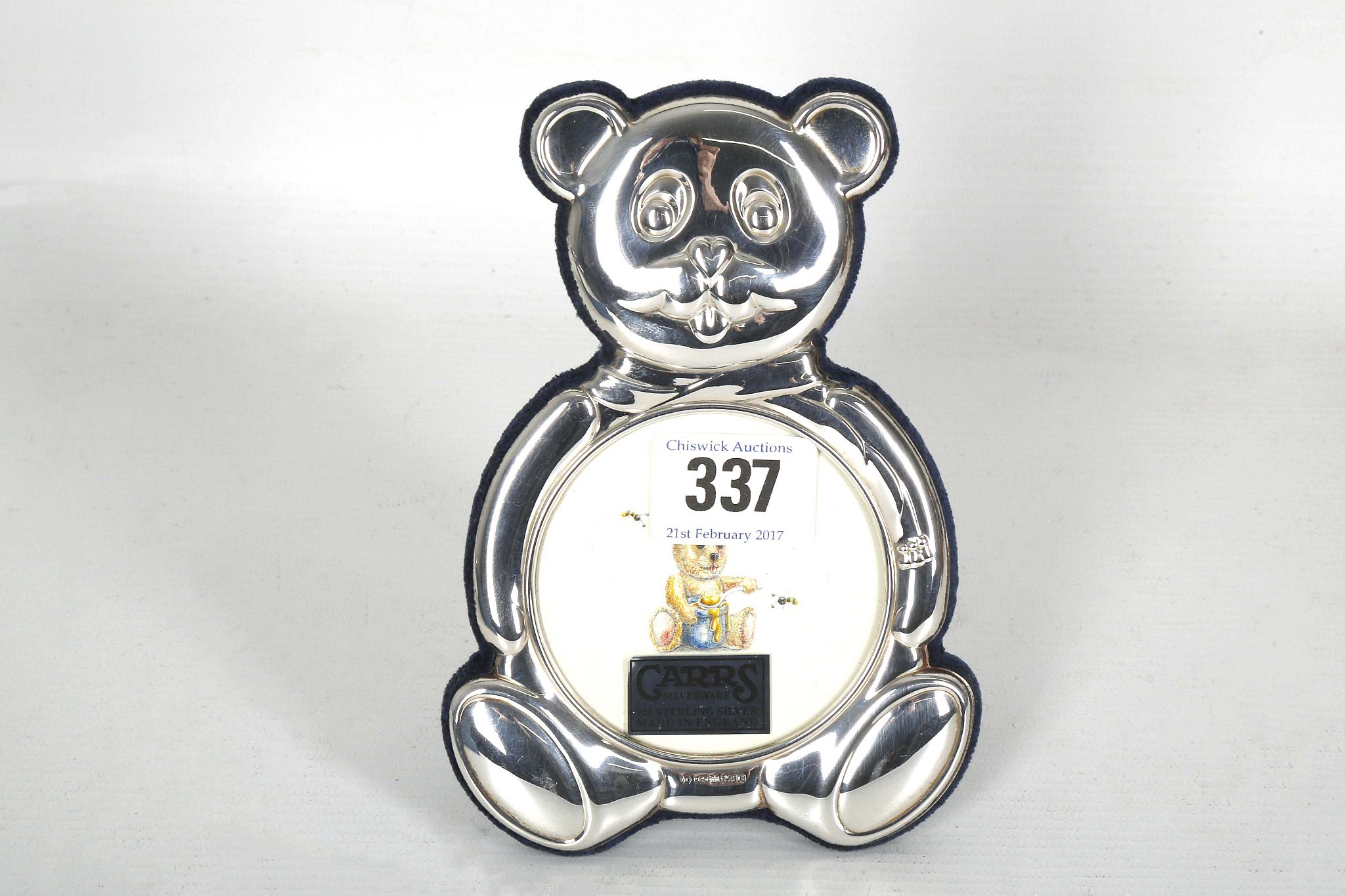 A Carrs of Sheffield, novelty hallmarked silver baby's photograph frame in the shape of a Teddy