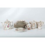 A collection of Dresden porcelain tea and dinnerware, late 19th Century, finely painted in the
