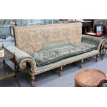 In the manner of Lenygon & Morant. A 19th Century 4 seater sofa, carved and giltwood frame,