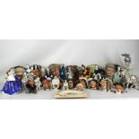 A large quantity of Royal Doulton character jugs, being sold together with some figures, also