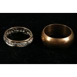 Two band rings, one set with paste stones (2).