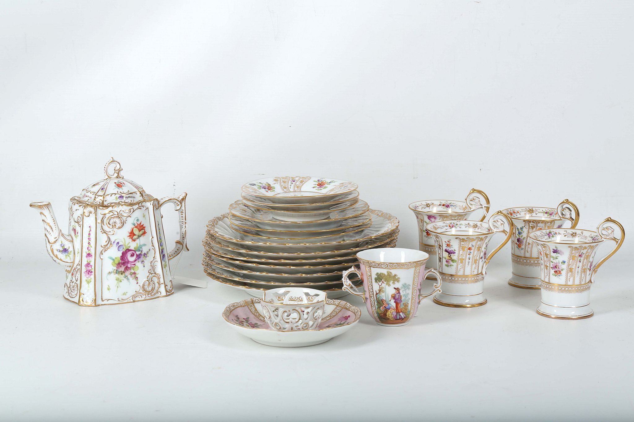 A collection of Dresden porcelain tea and dinnerware, late 19th Century, finely painted in the - Image 2 of 2