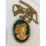 WITHDRAWN - A gold cameo pendant necklace, 1972. The 9 carat yellow gold cameo of a woman in profile