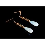 A pair of opal pendent earrings, Set with circular cabochon opals and suspending an opal drop,