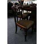 A set of 6 Victorian mahogany open back dining chairs, with carved central rail, drop in seats and